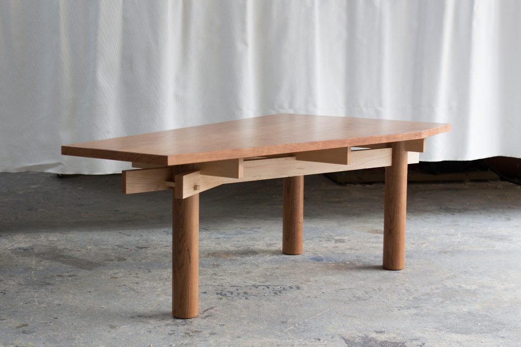 asymmetric coffee table with contrasting wood, cherry and maple