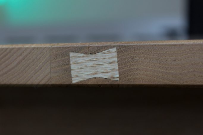 butterfly insert detail on chestnut tabletop